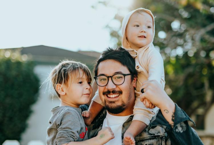 A family enjoying outside time together.